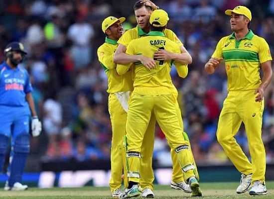 Australia triumph over India by 34 runs despite Rohit's 100