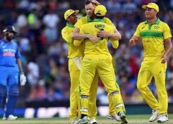Australia triumph over India by 34 runs despite Rohit's 100